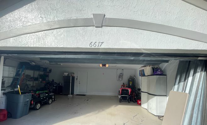 It shudders, sticks, or screeches on the way up — garage door service in Tallahassee