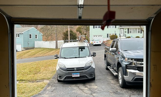 A shop or warehouse door has your crew stuck outside — garage door service in Tallahassee